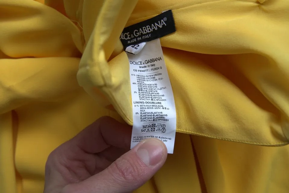 Желтое платье миди Dolce & Gabbana с одним плечом и разрезом сбоку