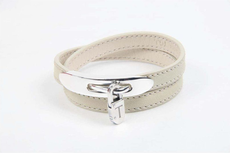 Tods Oq Metall kalitlargullaydi